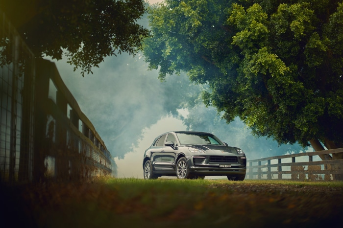 Porsche Macan SUV on a grassy path