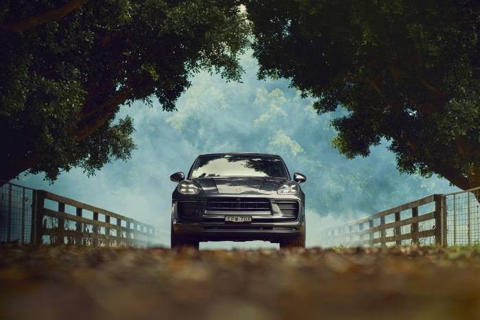 Porsche Macan SUV on a foggy road