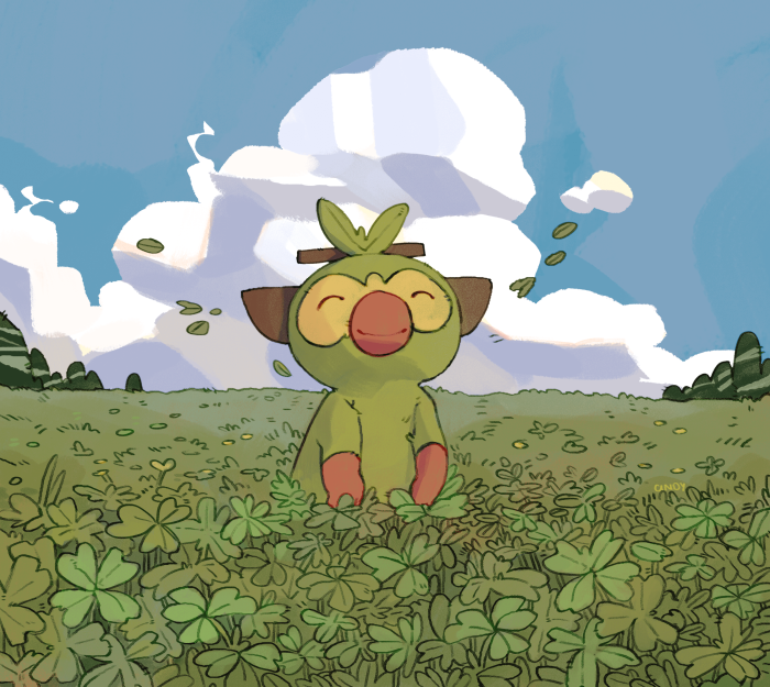 Grookey from Pokémon in a field of clovers