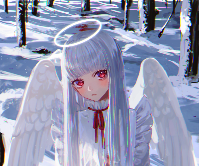 Angel with white wings and halo in snowy forest