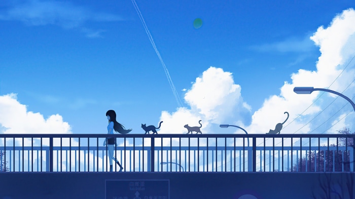 Girl and cats on a bridge under a blue sky