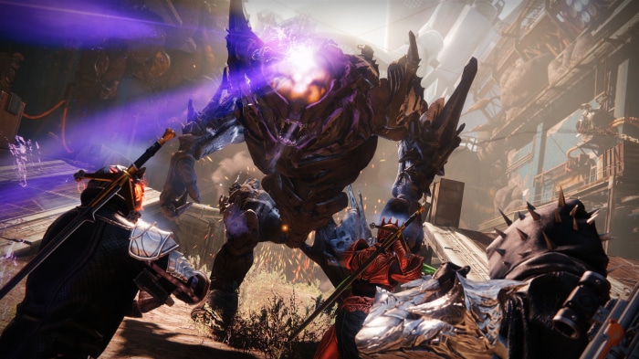 Guardians fighting a large monster in Destiny 2: Beyond Light