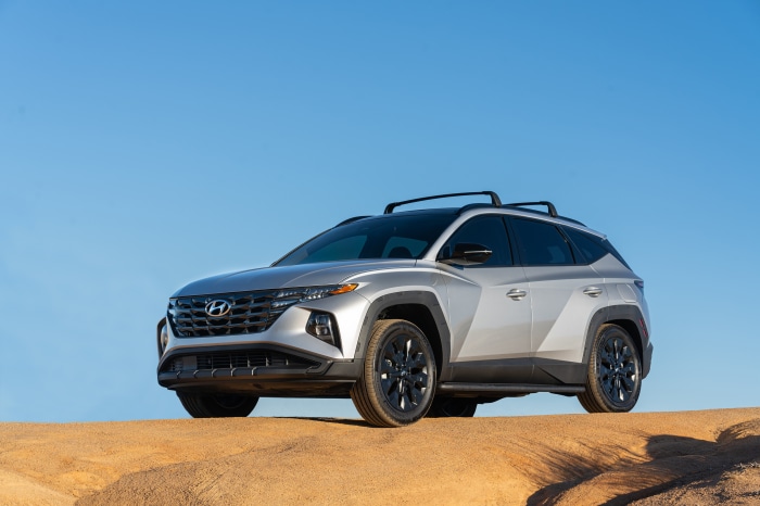Silver Hyundai Tucson XRT SUV on Sand Dune