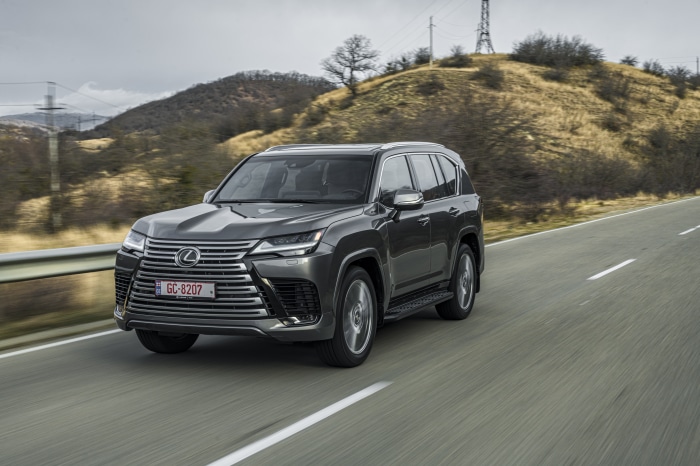 Lexus LX 600 SUV driving on a road