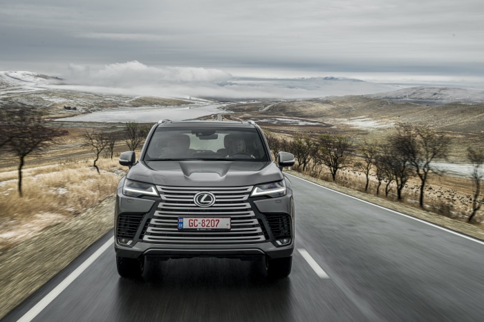 Lexus LX 600 SUV driving on a road
