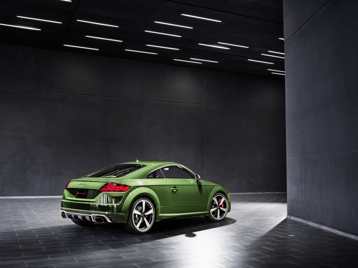 Green Audi TT RS Coupé in a modern building