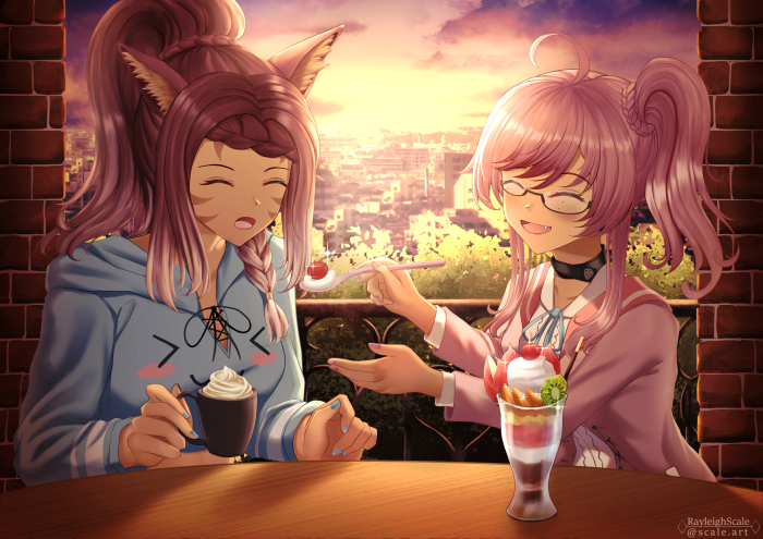 Two girls enjoying dessert on a balcony at sunset