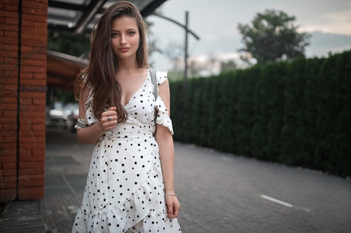 Woman in polka dot dress
