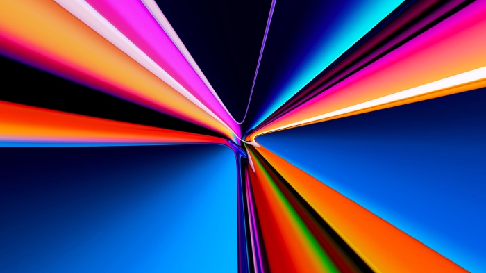 Abstract colorful light streaks on dark blue background