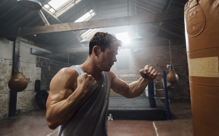 Chris Hemsworth boxing in a gym