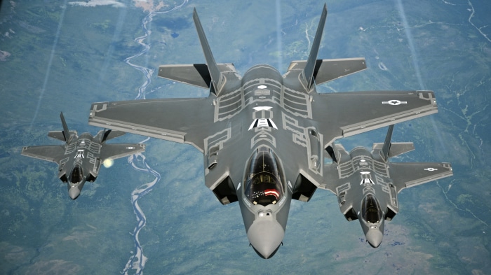 Three F-35A Lightning II aircraft in flight
