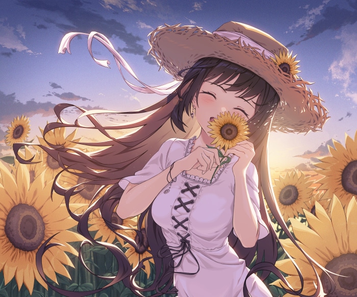 Girl in Straw Hat in Sunflower Field
