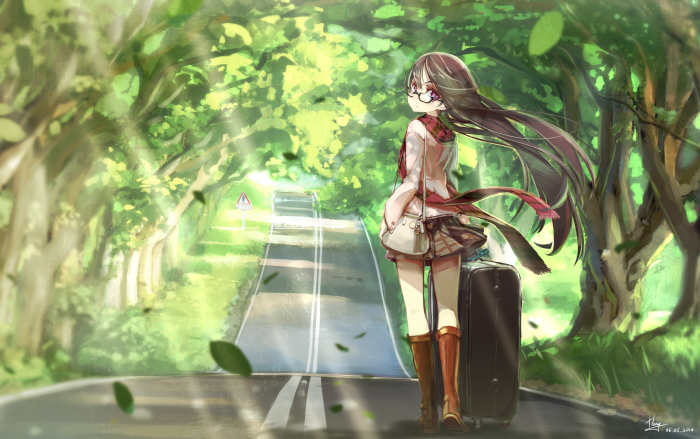 Girl with glasses and suitcase on a tree-lined road