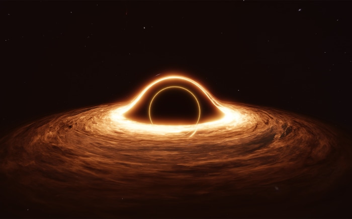 Black hole with glowing accretion disk in space