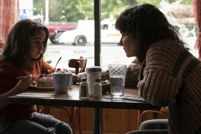 Sandra Bullock and young girl eating pancakes