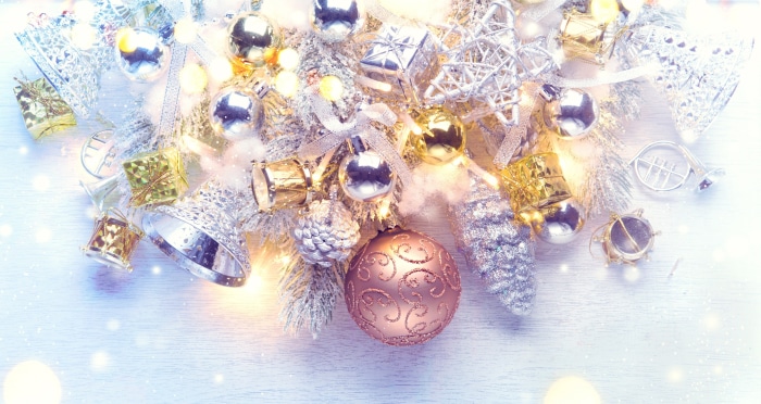 Christmas ornaments and decorations on a white surface