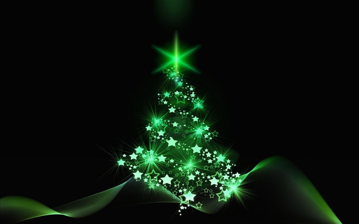 Green glowing Christmas tree made of stars