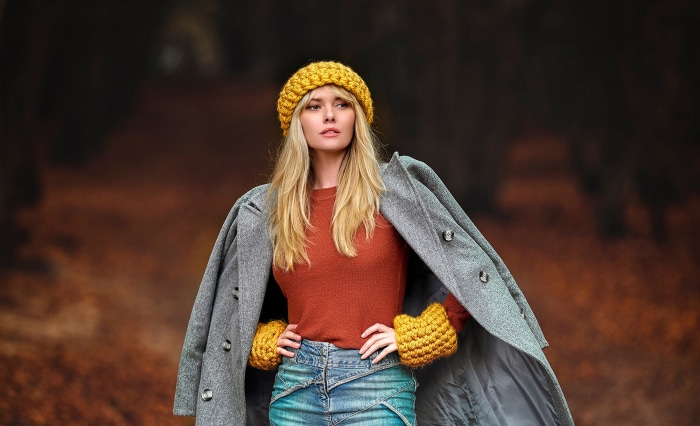 Woman wearing a coat and hat