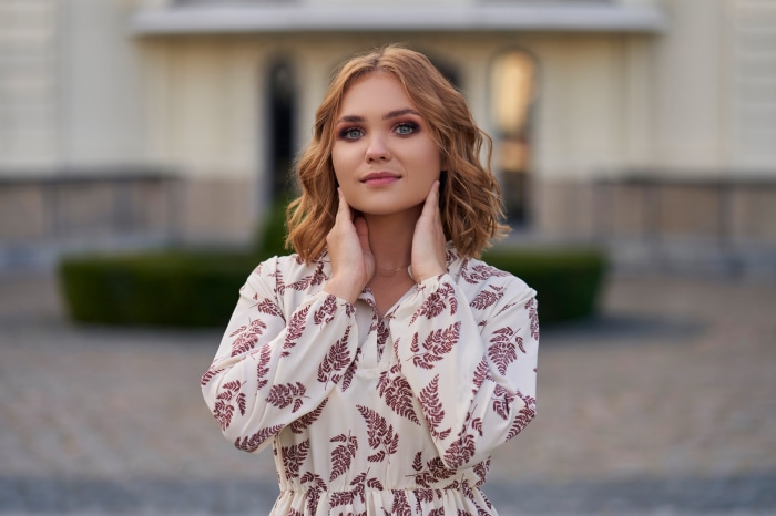 Redhead woman in a floral dress