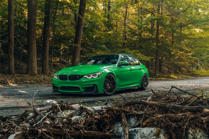 Green BMW M3 F80 Sedan on Forest Road