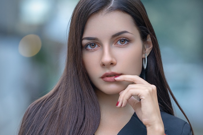 Brunette woman with hoop earrings