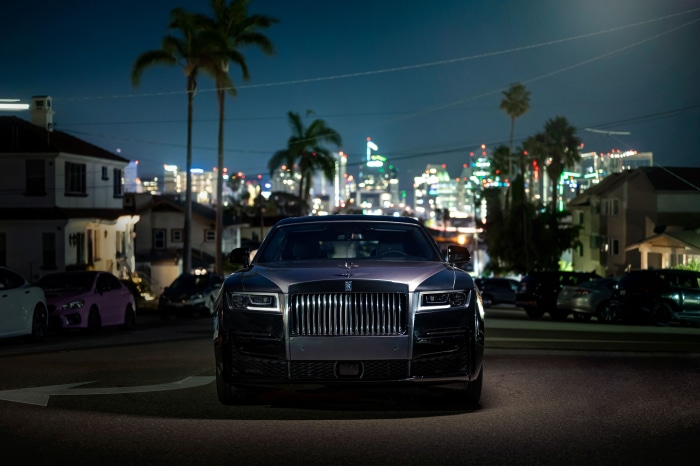 Rolls-Royce Ghost parked on a street at night