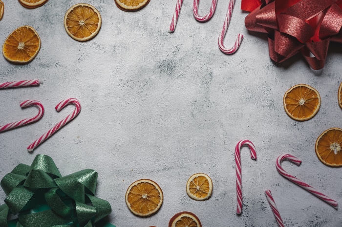 Christmas decorations with dried oranges and candy canes 4K