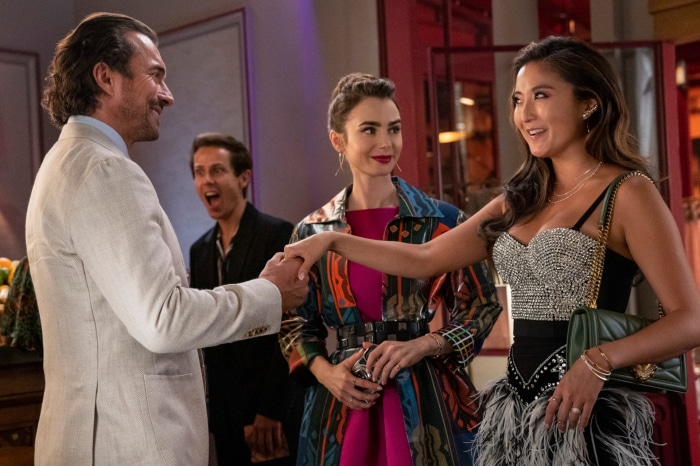 Emily in Paris: Lily Collins and Ashley Park at a party