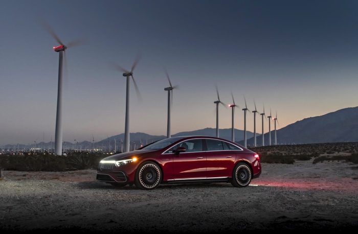 Mercedes-AMG EQS 53 4MATIC electric car with wind turbines