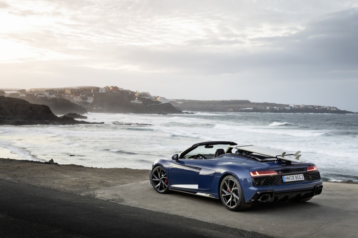 Blue Audi R8 V10 Convertible with Surfboards by the Ocean