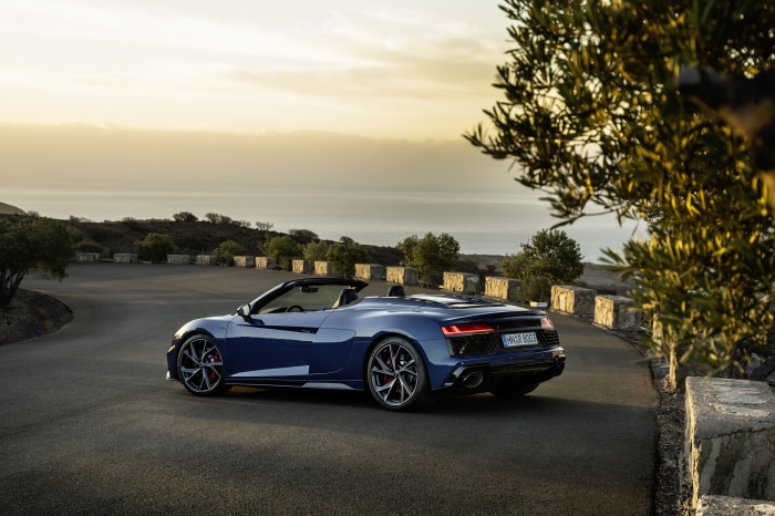 Blue Audi R8 V10 Cabriolet on a road