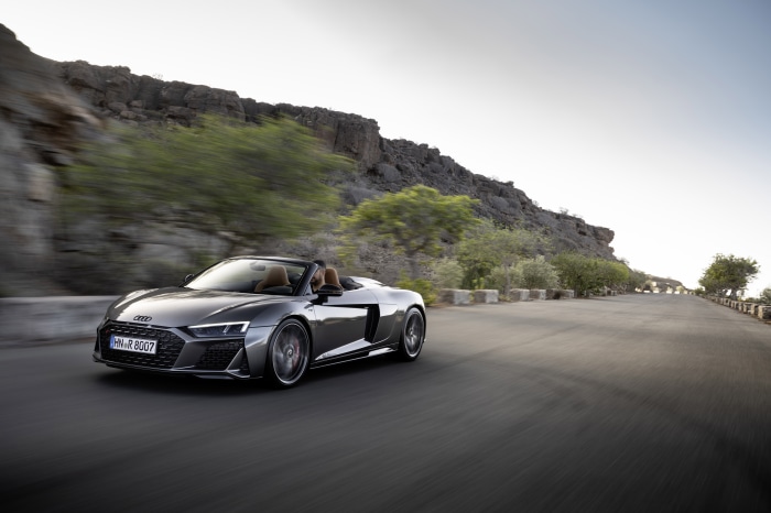 Audi R8 V10 Cabriolet driving on a road
