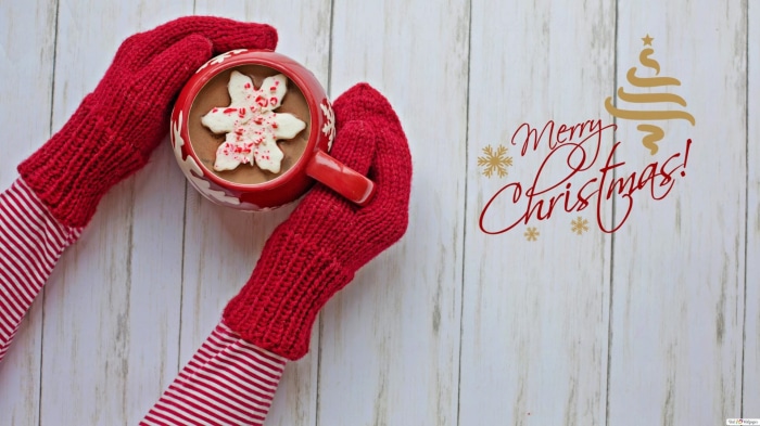 Merry Christmas hot chocolate with snowflake cookie