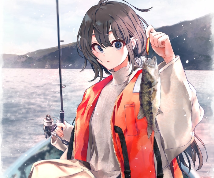 Girl fishing with a catch