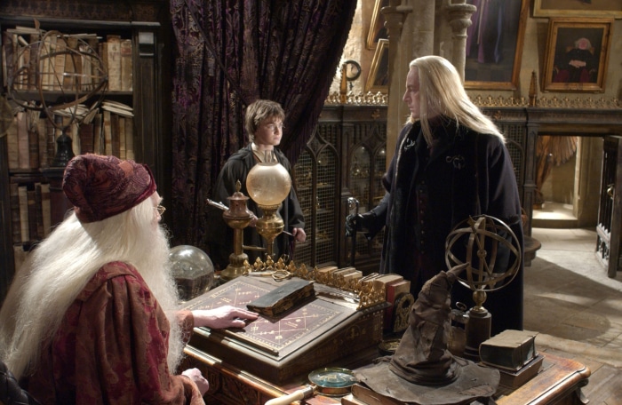 Albus Dumbledore, Harry Potter, and Lucius Malfoy in Dumbledore's office