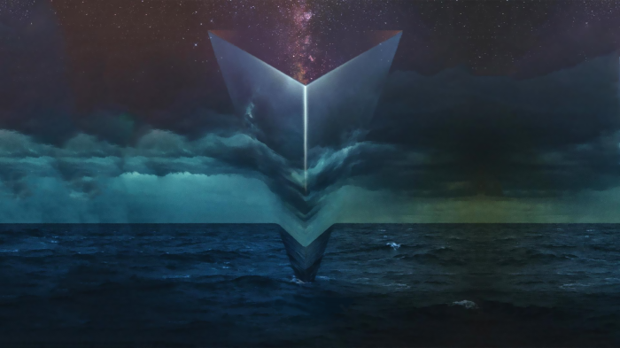 Abstract geometric shape over ocean and stormy sky