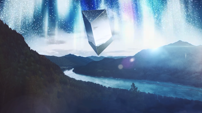 Crystal floating above mountains with aurora borealis