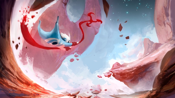 A blue creature with a red scarf flies through a rocky landscape