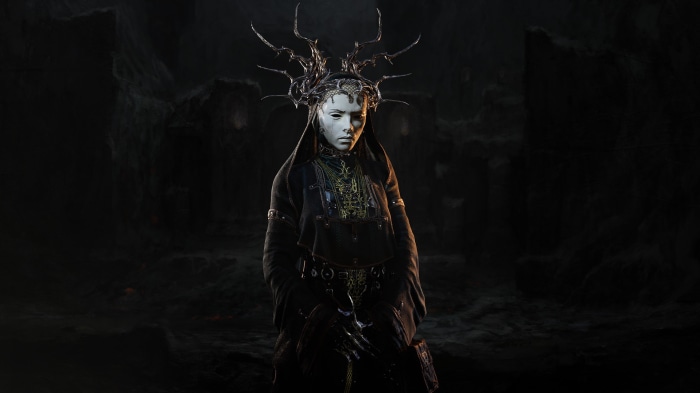 Woman with elaborate headdress and dark robes