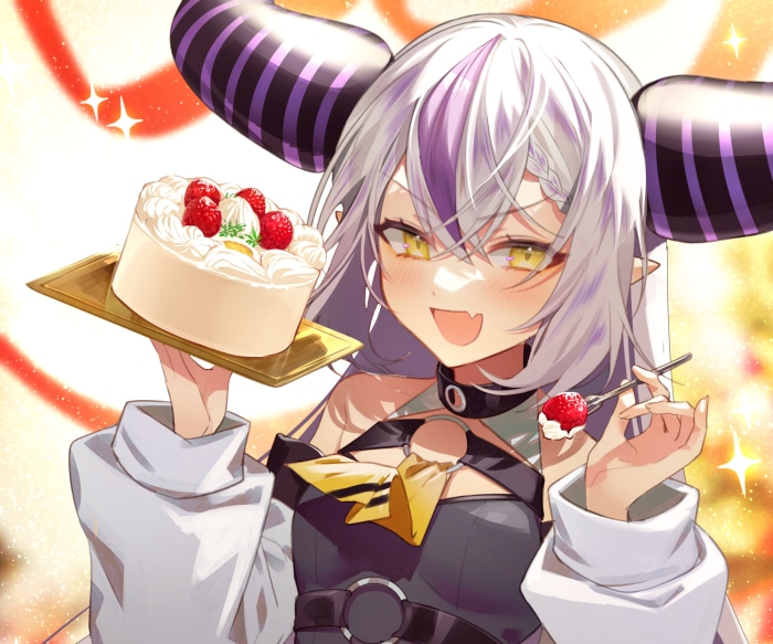 La+ Darknesss from Hololive holding a cake