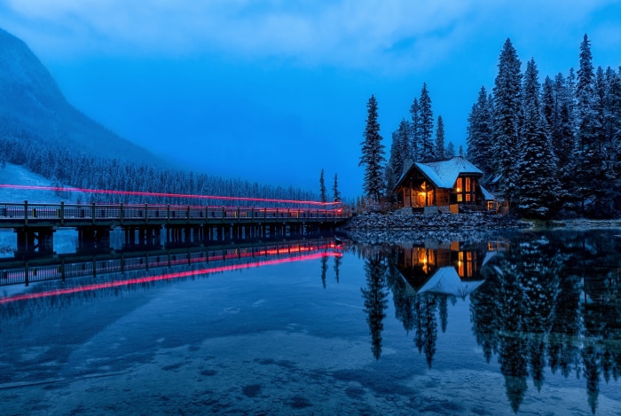 Winter Cabin and Bridge Reflection on Emerald Lake