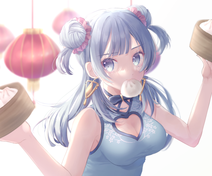 Girl eating dumplings with Chinese lanterns