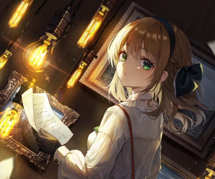 Girl with green eyes holding paper near light bulbs