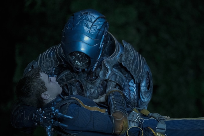 Robot holding Will Robinson from Lost in Space