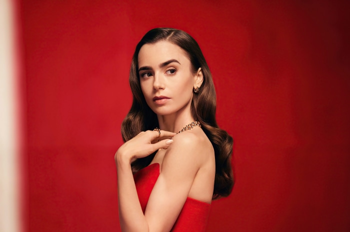 Lily Collins in red dress with jewelry