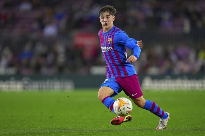 Gavi playing soccer for Barcelona