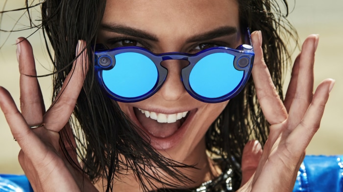 Kendall Jenner wearing blue sunglasses