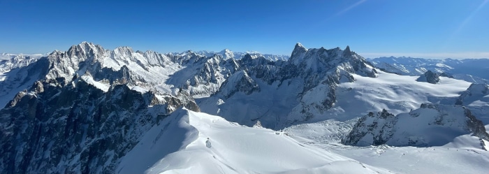 Snowy mountain range with Aiguille du Midi in Chamonix
