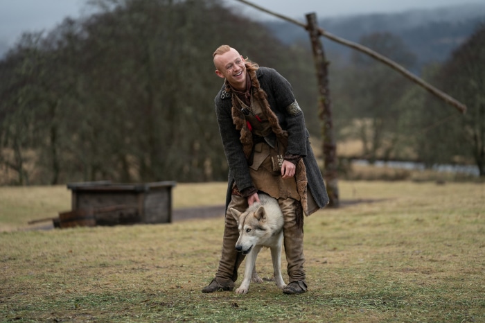 Man with dog in Outlander