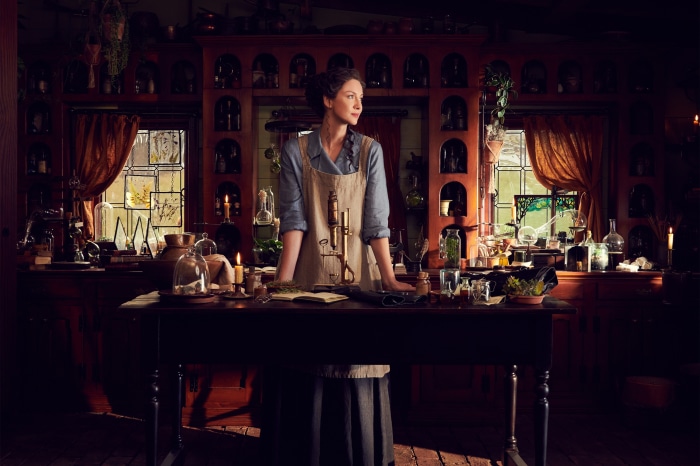 Claire Fraser from Outlander in her apothecary